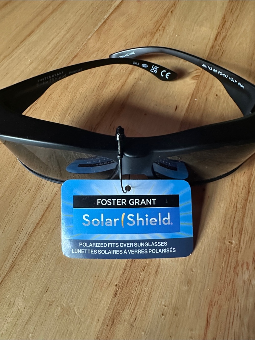 Foster Grant Solar Shield Polarized Black Wrap Sunglass Shield